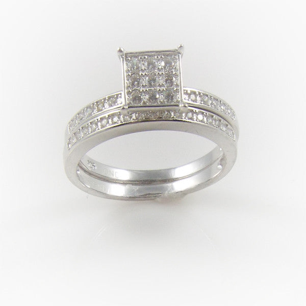 Triple Threat - Sterling silver set of three stacking bands with white pavé czs and center nine stone cubic zirconia solitaires