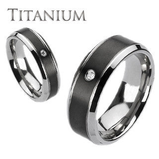 Midnight Star– Brushed black and silver titanium his and hers ring with cubic zirconia solitaire