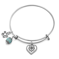 Heartfelt – Expandable silver-tone bangle heart charm bracelet with turquoise magnesite bead