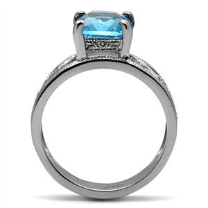 Ostara - Detailed Craftwork Stainless Steel Comfort-Fit Ring with Aquamarine and Clear Cubic Zirconias